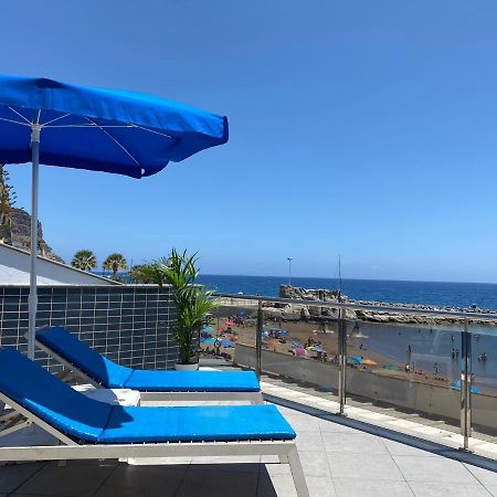 פוארטו דה מוגן Billy'S Beachfront Apartment With Pool Access מראה חיצוני תמונה