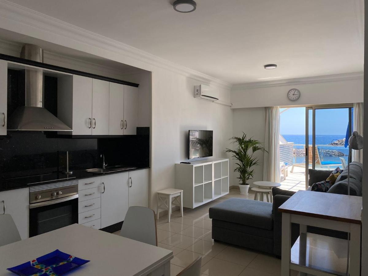 פוארטו דה מוגן Billy'S Beachfront Apartment With Pool Access מראה חיצוני תמונה