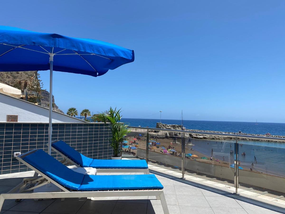 פוארטו דה מוגן Billy'S Beachfront Apartment With Pool Access מראה חיצוני תמונה